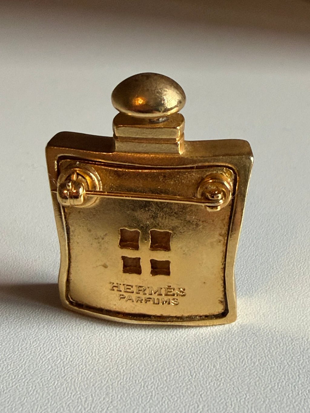 Vintage Hermès 24 Faubourg Perfume Bottle Brooch – Gold Tone – Rare Collector’s Piece