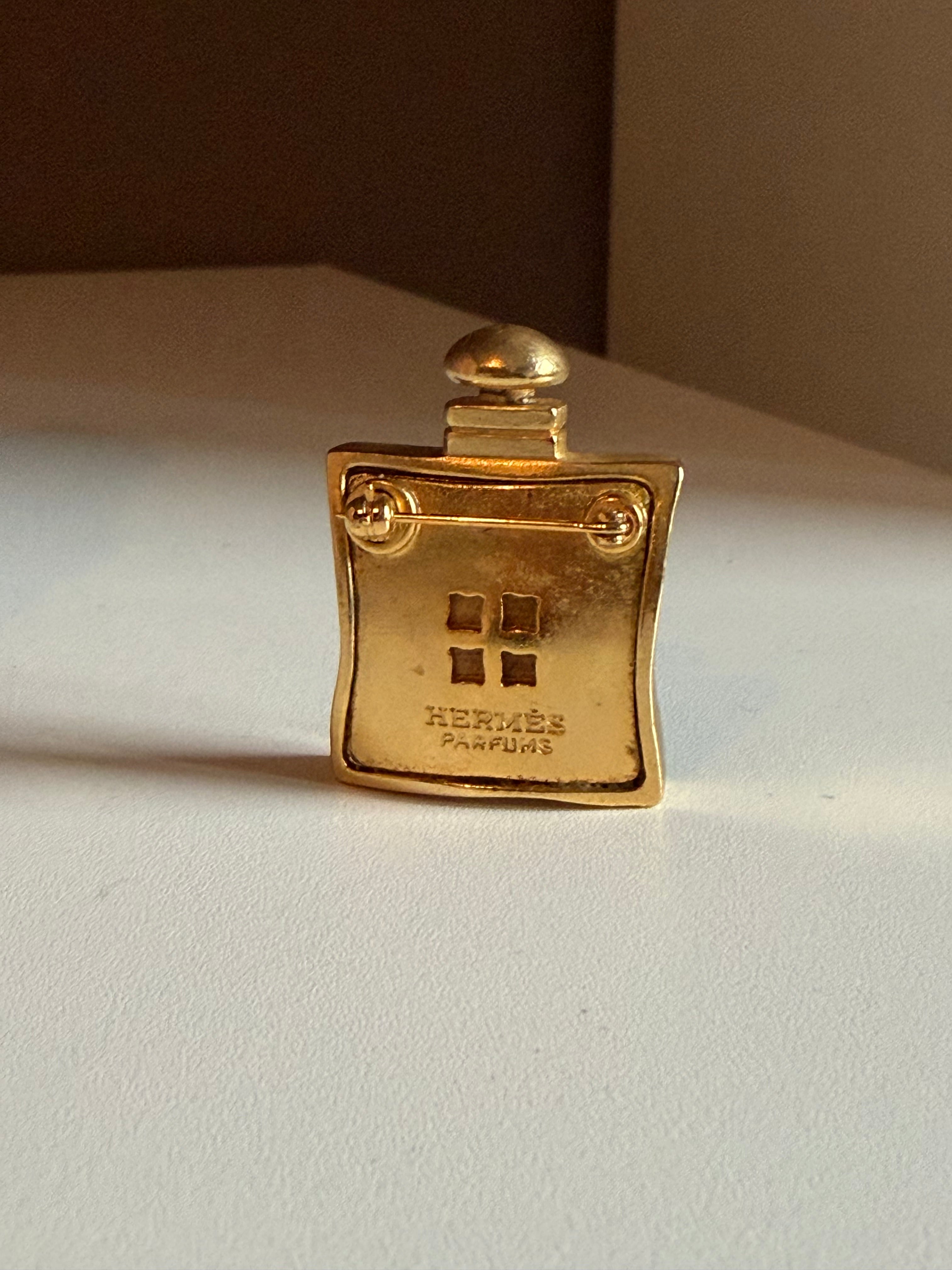Vintage Hermès 24 Faubourg Perfume Bottle Brooch – Gold Tone – Rare Collector’s Piece